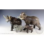 A collection of Beswick elephants comprising; model number 998, gloss, 26cm high,