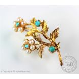 A 9ct gold turquoise and seed pearl set floral spray brooch, London 1974, weight 4.5gms, 3.