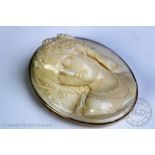 A Victorian carved ivory brooch,