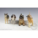 A collection of four Beswick dogs, each boxed, comprising; Alsatian 'Ulrica of Brittas' No.