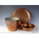 An Art Nouveau Joseph Sankey embossed copper jardiniere, 17cm high, a Newlyn planished copper bowl,