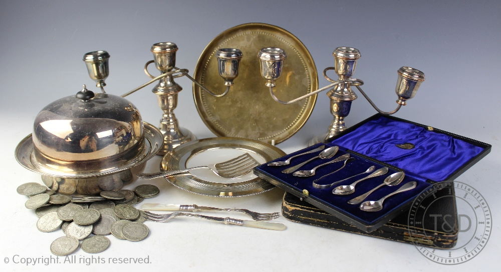 A selection of silver plated wares to include a cased set of teaspoons and a pair of sugar nip,