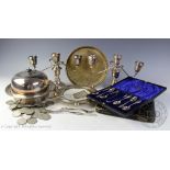 A selection of silver plated wares to include a cased set of teaspoons and a pair of sugar nip,