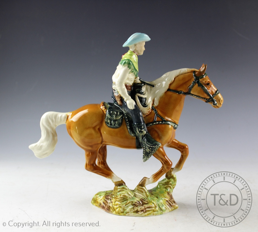 A Beswick Canadian mounted cowboy, designed by Mr.