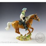 A Beswick Canadian mounted cowboy, designed by Mr.