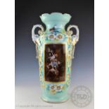 A large Austrian porcelain vase, printed with a scene of children staling cookies from a pantry,