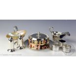 A selection of silver and plated wares, comprising; a silver mounted shell Birmingham 1911,
