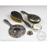 A selection of silver items comprising; a silver presentation fob, Birmingham 1899,