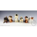 A collection of six Beswick dogs, comprising: Cairn Terrier No.