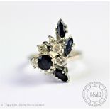 A sapphire and diamond asymmetrical dress ring, London 1988,