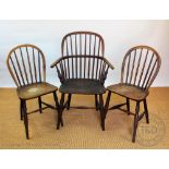 A pair of 19th century beech and ash country kitchen chairs, with solid seats, on turned legs,