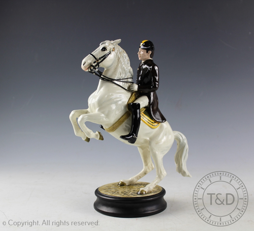 A Beswick Lipizzaner with rider, designed by Graham Tongue, model number 2467,