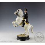 A Beswick Lipizzaner with rider, designed by Graham Tongue, model number 2467,