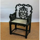 A Chinese green painted carved wood chair, of 18th century style, with upholstered sear,