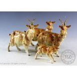 A Beswick goat family, model number.