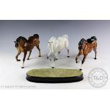 Three Beswick Spirit of Freedom horses, model number 2689, designed by Graham Tongue,