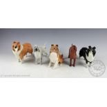 A collection of five Beswick dogs, comprising: Irish Setter 'Sugar of Wendover' No. 966, 14.