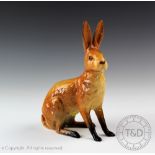 A Beswick Hare/seated, model number 1025, designed by Arthur Gredington, issued 1945-1963, 17.