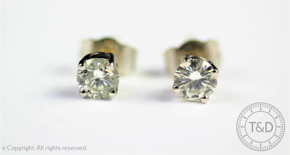 A pair of diamond solitaire earrings, - Image 3 of 3