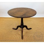 An 18th century and later oak occasional table, with three plank top,