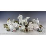 A selection of crested wares including a Kensington china elephant, a Victoria china pig, Goss,
