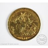 A Victorian gold sovereign dated 1871, London Mint,