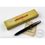A Montblanc fountain pen, circa 1960, black body stamped 'Mont Blanc'in white, numbered '.