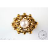 A 9ct gold and cultured pearl dress ring, Birmingham 1974,