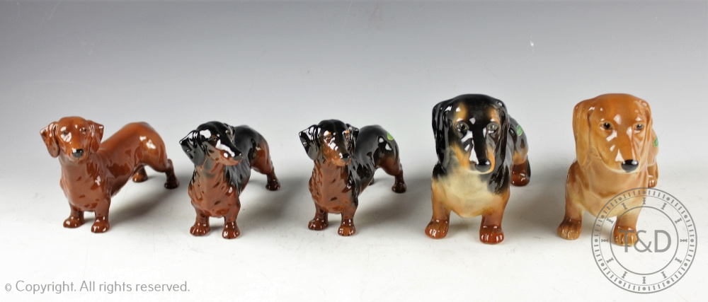 A collection of five Beswick Dacshunds comprising; 2 x No.