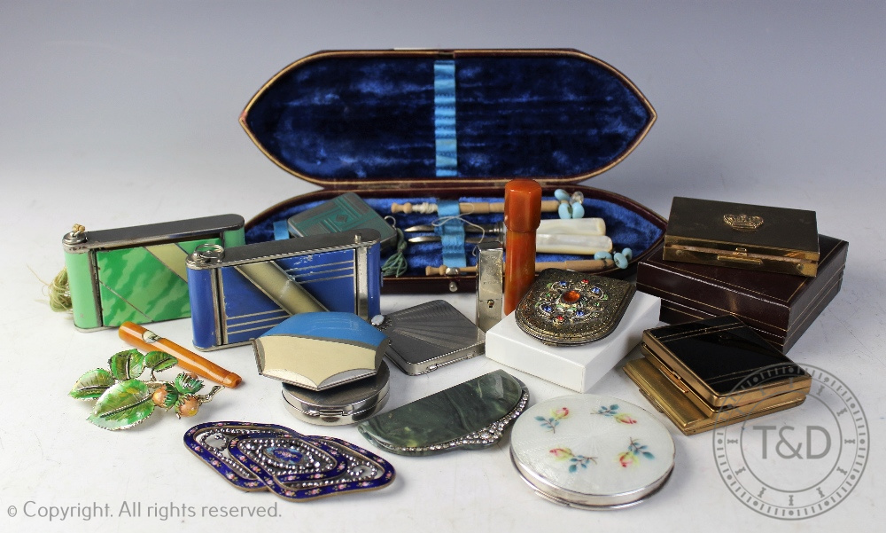 A collection of assorted compacts and ephemera,