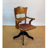 A near pair of Edwardian oak swivel desk chairs, vintage style,