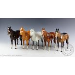 Five Beswick 'Imperial' horses, model number 1557, designed by Albert Hallam and James Hayward,