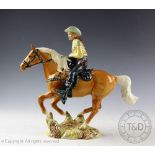 A Beswick Canadian mounted cowboy, designed by Mr.