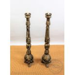 A pair of carved and gilt wood altar type pricket candlesticks,