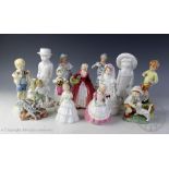 A collection of figurines, to include; Royal Worcester Monday's child is fair of face 3519,