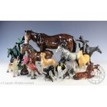 A quantity of assorted animals including a large Melba ware brown horse,