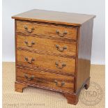 A George III style mahogany chest, of four graduated long drawers, on bracket feet,