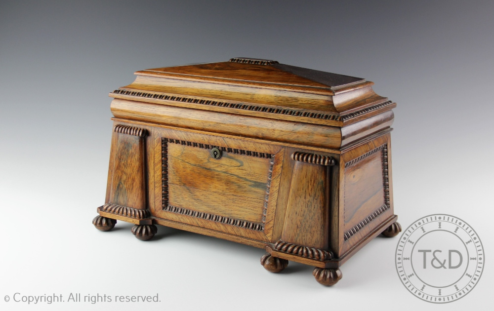 A George IV rosewood tea caddy in the manner of Gillows of Lancaster, of sarcophagus form,