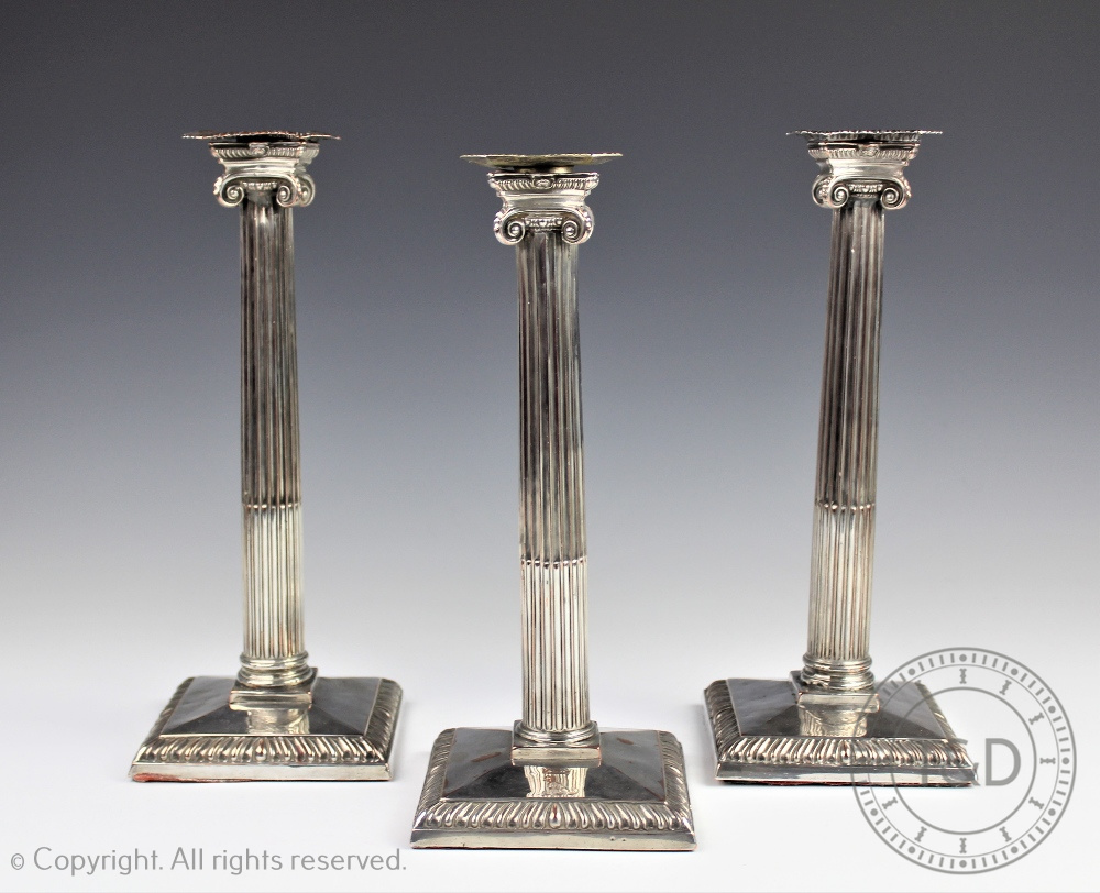 A set of three Old Sheffield plate Boulton and Fothergill candlesticks, 18th century,