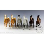 Six Beswick Palomino (Prancing Arab Type), model number 1261, designed by Arthur Gredington,