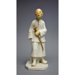 A Royal Worcester figure of an oriental man, model number 837, on canted base,