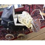 A vintage dolls carriage pram,