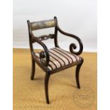 A Regency mahogany carver dining chair, with carved bar back and upholstered seat,