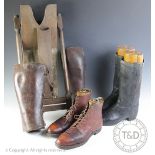 A pair of Gentlemans tan leather boots, with trees, with two pairs of black leather boots,