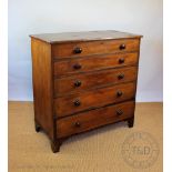 A Victorian mahogany mule chest, with hinged top above two dummy drawer and three real drawers,