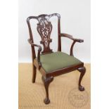 A George III style carved mahogany carver chair,