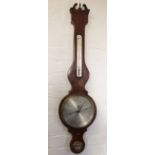 A George III inlaid mahogany wheel barometer, with silvered dial, thermometer and spirit level,