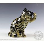 A Beswick Cat - seated scratching ear, model number 1877, in grey swiss roll,