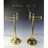 A pair of Edwardian style articulated brass desk lamps,