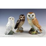 Three Beswick owls comprising; Barn owl, model number 1046A, 19cm high,
